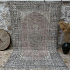 Blue 6' x 10' handmade vintage wool rug with geometric design, handmade in Turkey – Tessy.