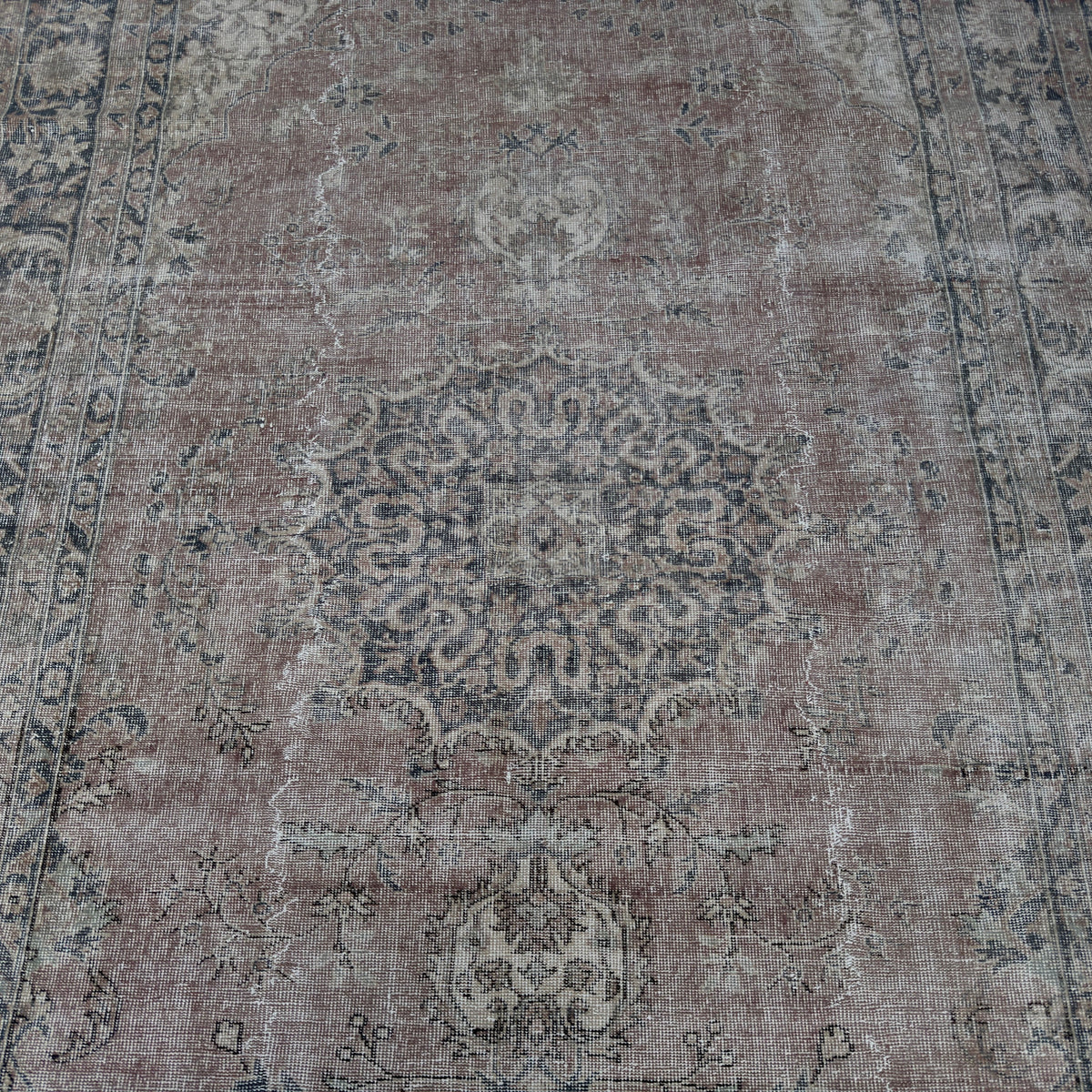 1970s blue Turkish handmade vintage wool rug with geometric design, hand-knotted weave and low pile.