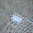 Beige 3' x 9' Turkish handwoven runner rug from the 1970s with traditional design.