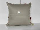 Close-up of the gray Turkish kilim pillow showing striped details.