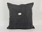 Close-up of the blue Turkish kilim pillow showing traditional details.