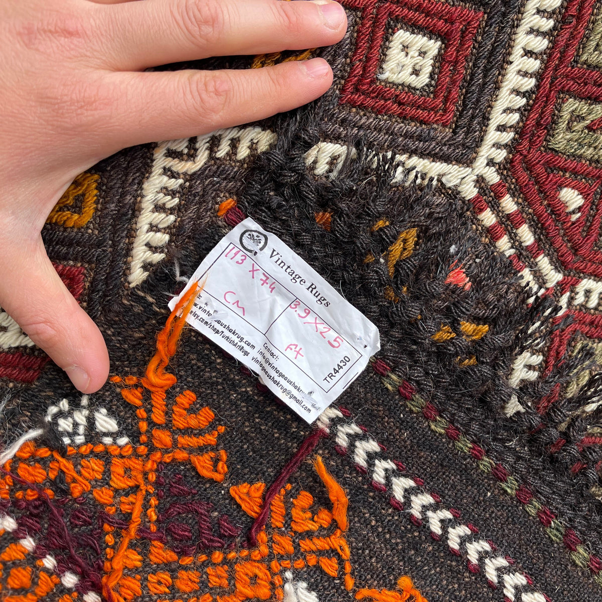 1970s orange Turkish kilim rug with traditional design, flatweave construction and low pile.