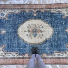 1970s blue Turkish large medallion rug with medallion design, hand-knotted weave and low pile.