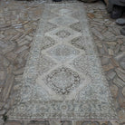 Pale Blue 5' x 13' Turkish large traditional rug in wool and cotton, shown on the floor.