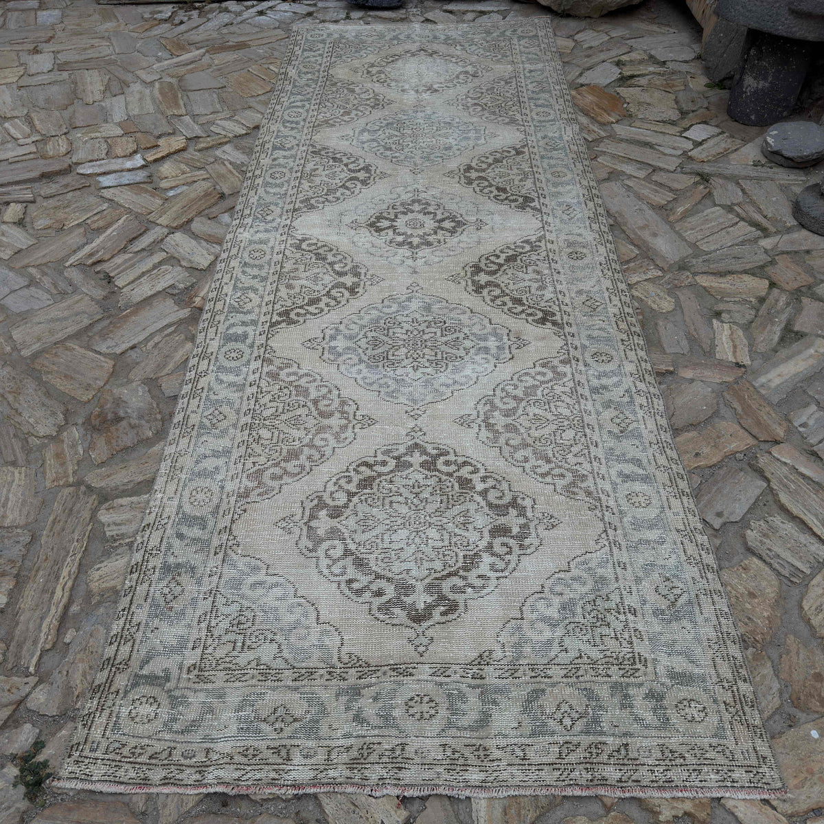 Pale Blue 5' x 13' Turkish large traditional rug in wool and cotton, shown on the floor.