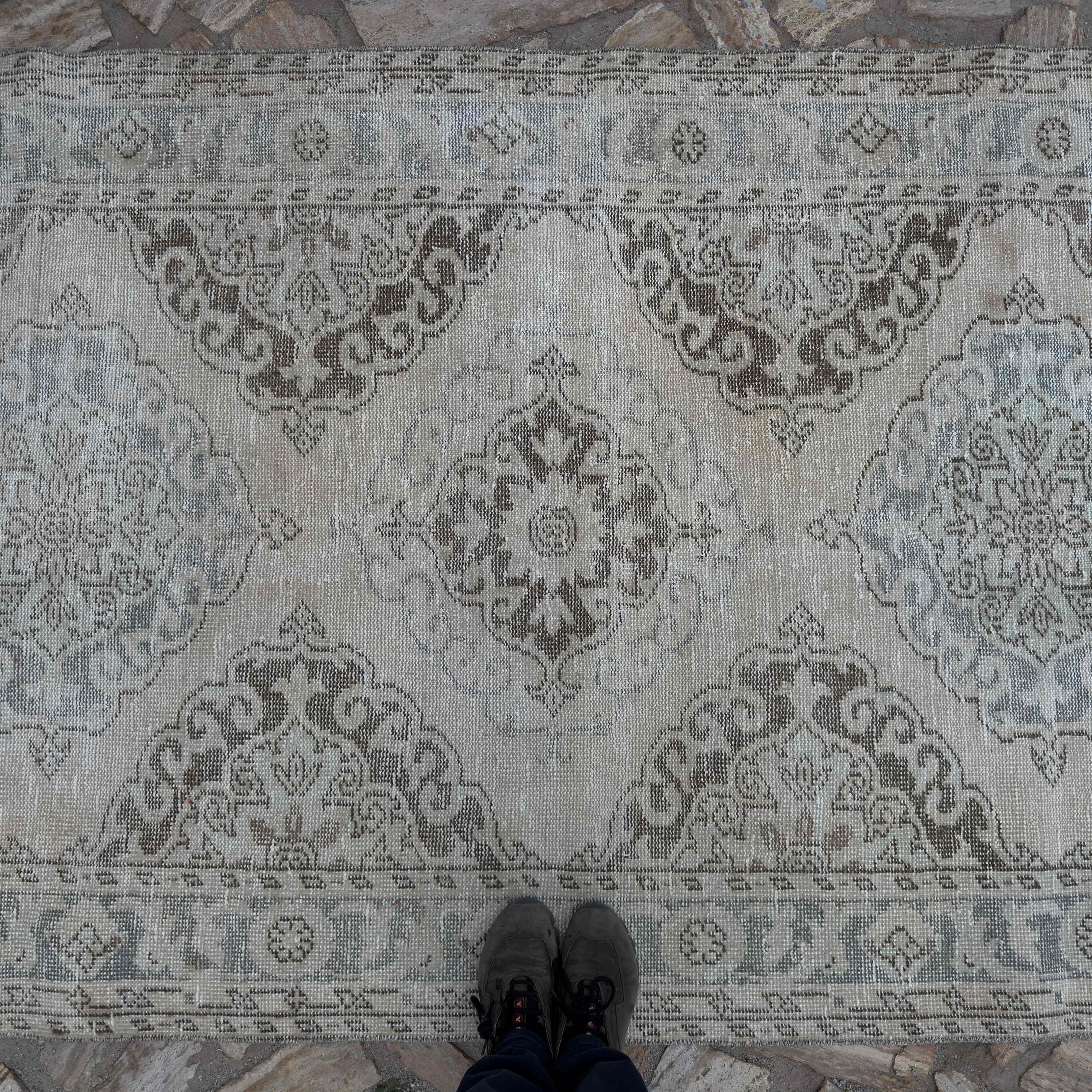 1970s pale blue Turkish large traditional rug with neutral design, hand-knotted weave and low pile.