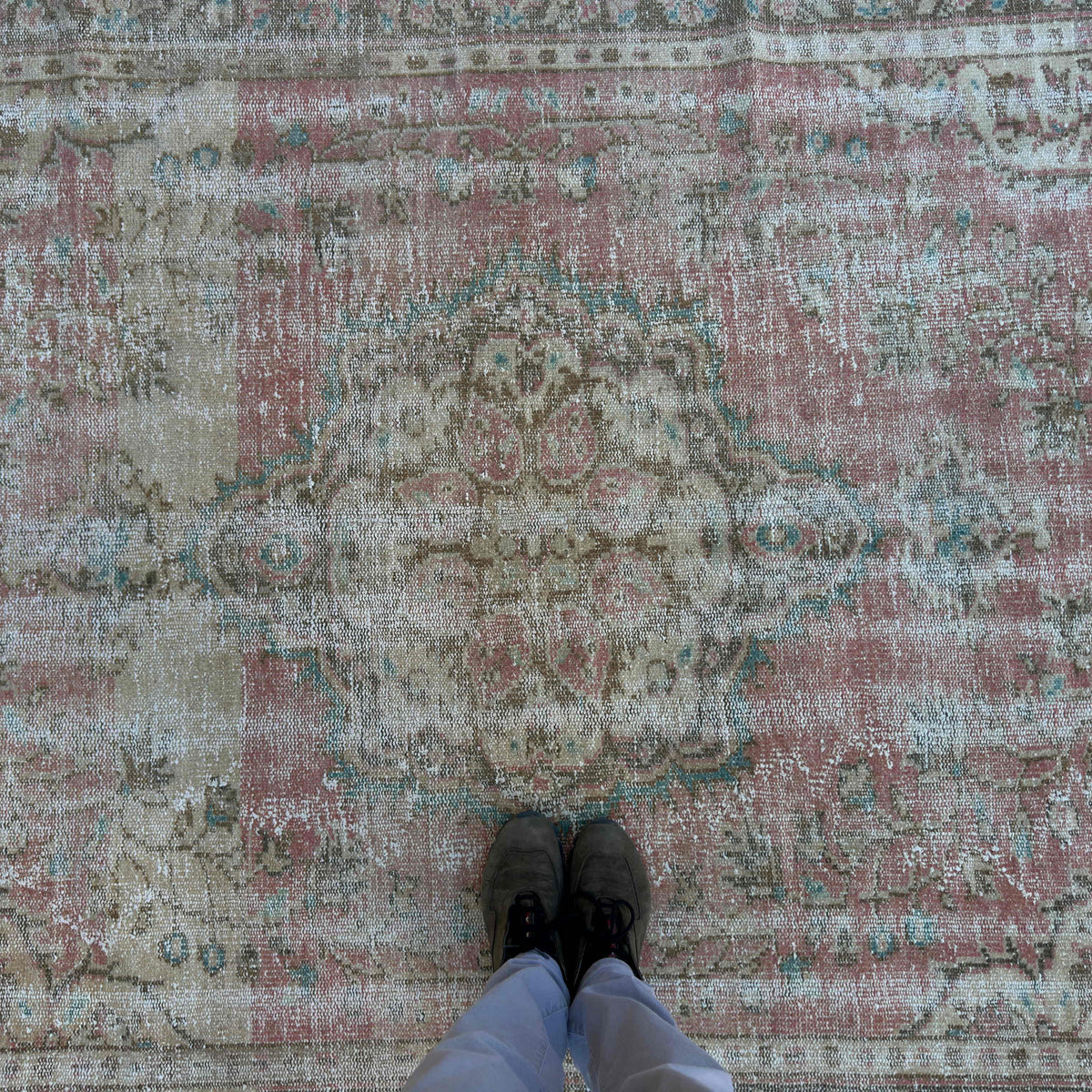 1970s pink large turkish rug with medallion design, hand-knotted weave and low pile.