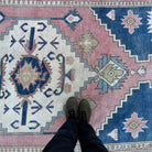 1970s blue large turkish rug with traditional design, hand-knotted weave and low pile.