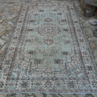 Pale Green 6' x 10' large turkish rug in wool and cotton, shown on the floor.