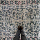 1970s green large turkish rug with floral design, hand-knotted weave and low pile.