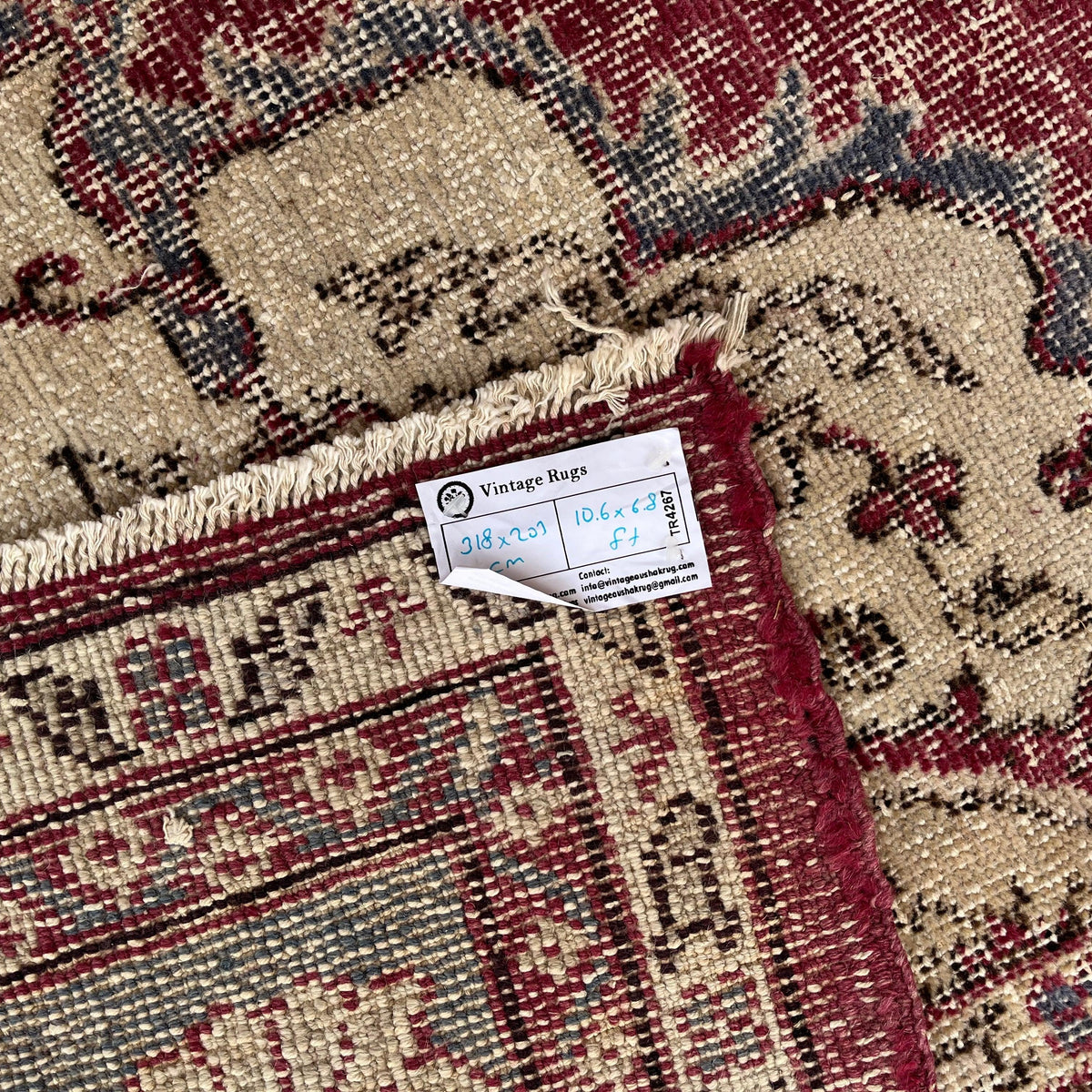1970s red large turkish rug with medallion design, hand-knotted weave and low pile.