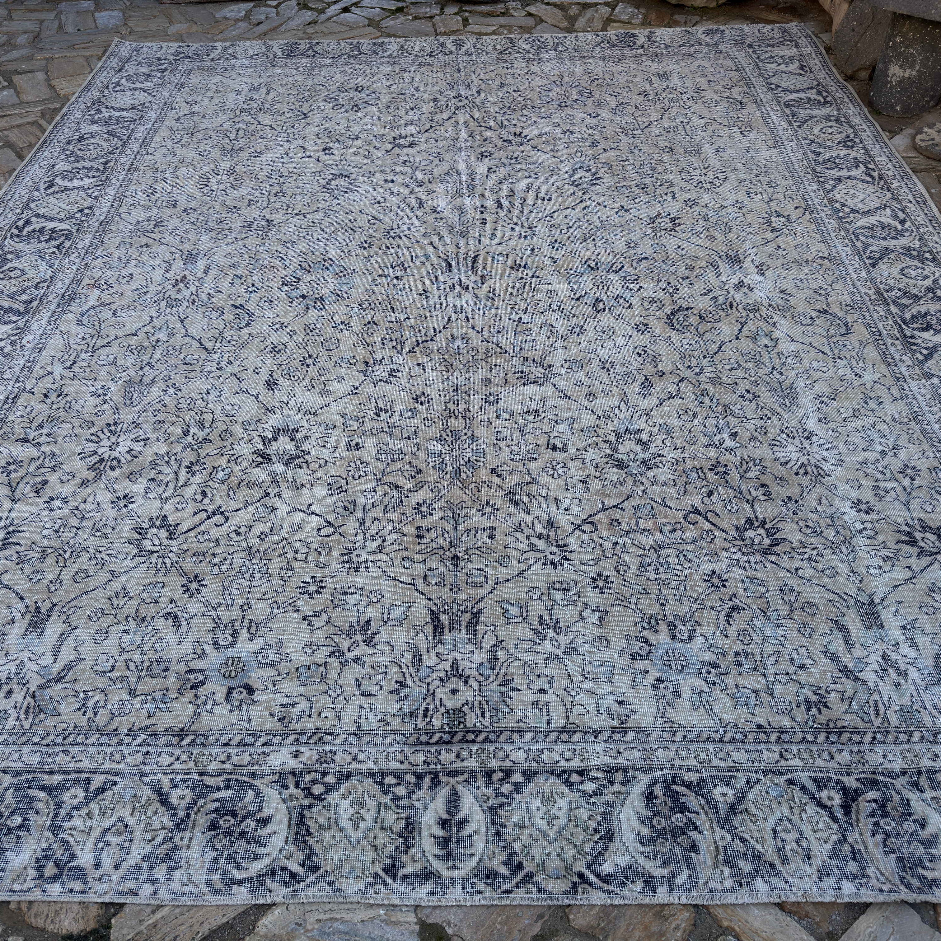 Pale Blue 11' x 13' Turkish large vintage floral rug in wool and cotton, shown on the floor.