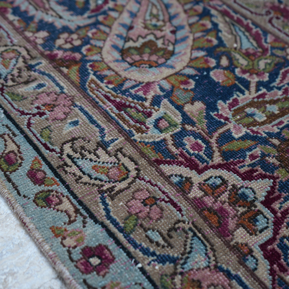 1970s burgundy large vintage persian rug with medallion design, hand-knotted weave and low pile.