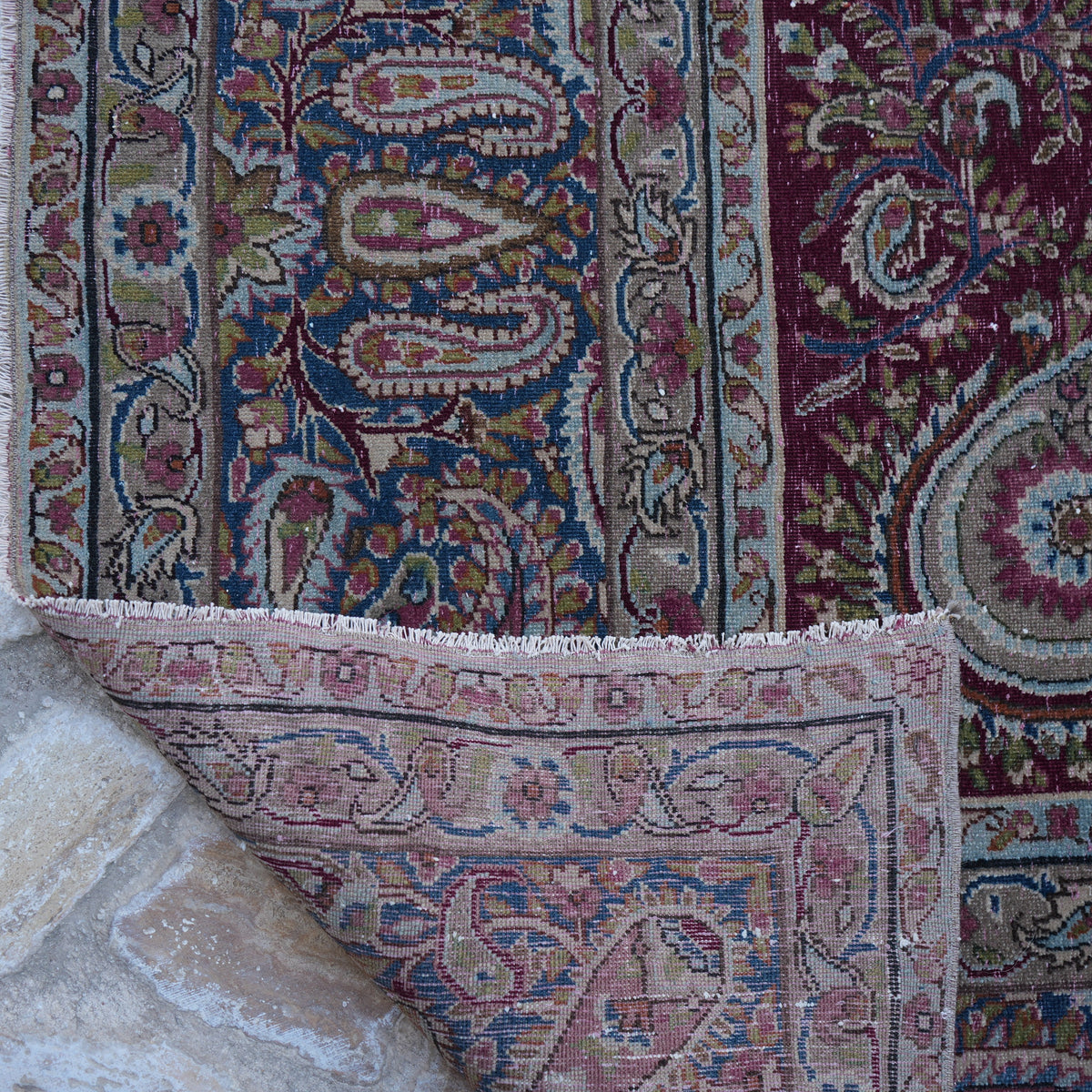 Additional view of the burgundy large vintage persian rug, hand-knotted in wool and cotton.