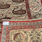 Additional view of the beige large vintage persian rug, hand-knotted in wool and cotton.
