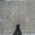 1970s beige large vintage persian rug with neutral design, hand-knotted weave and low pile.