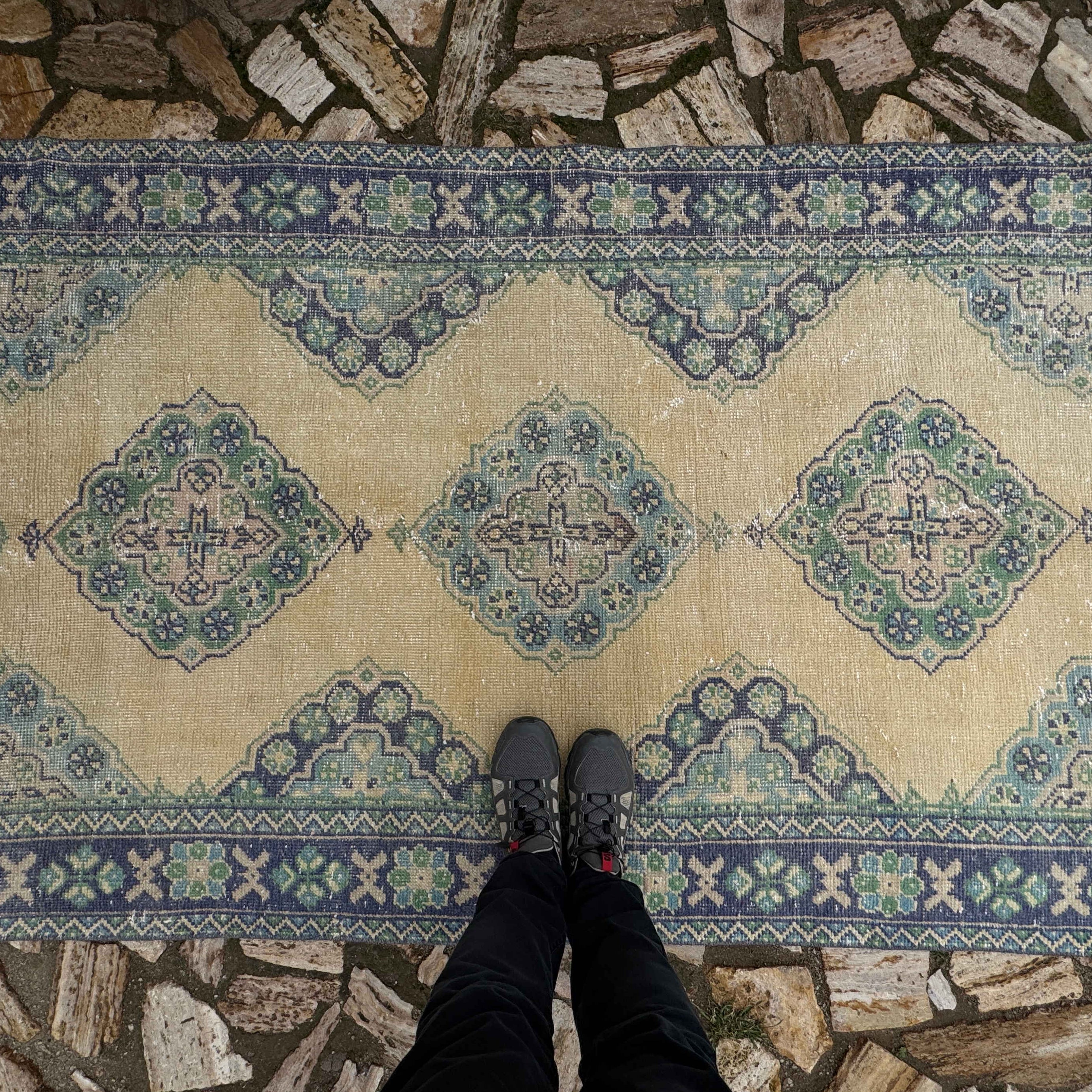 1970s pale blue Turkish large vintage rug with traditional design, hand-knotted weave and low pile.