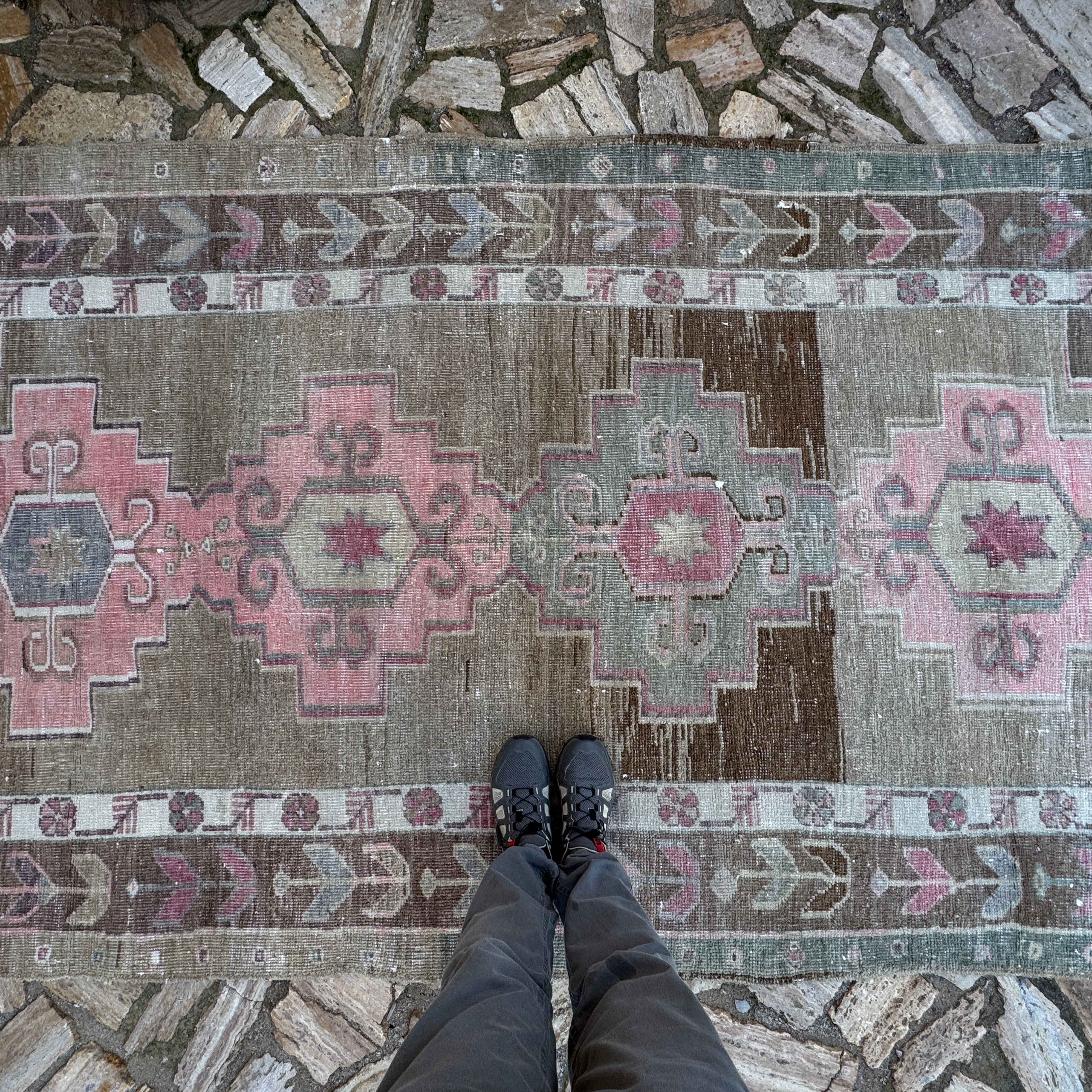 1970s pale pink Turkish large vintage rug with traditional design, hand-knotted weave and low pile.