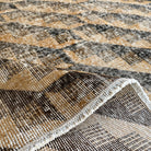 Orange 7' x 10' Turkish large vintage rug in wool and cotton, shown on the floor.