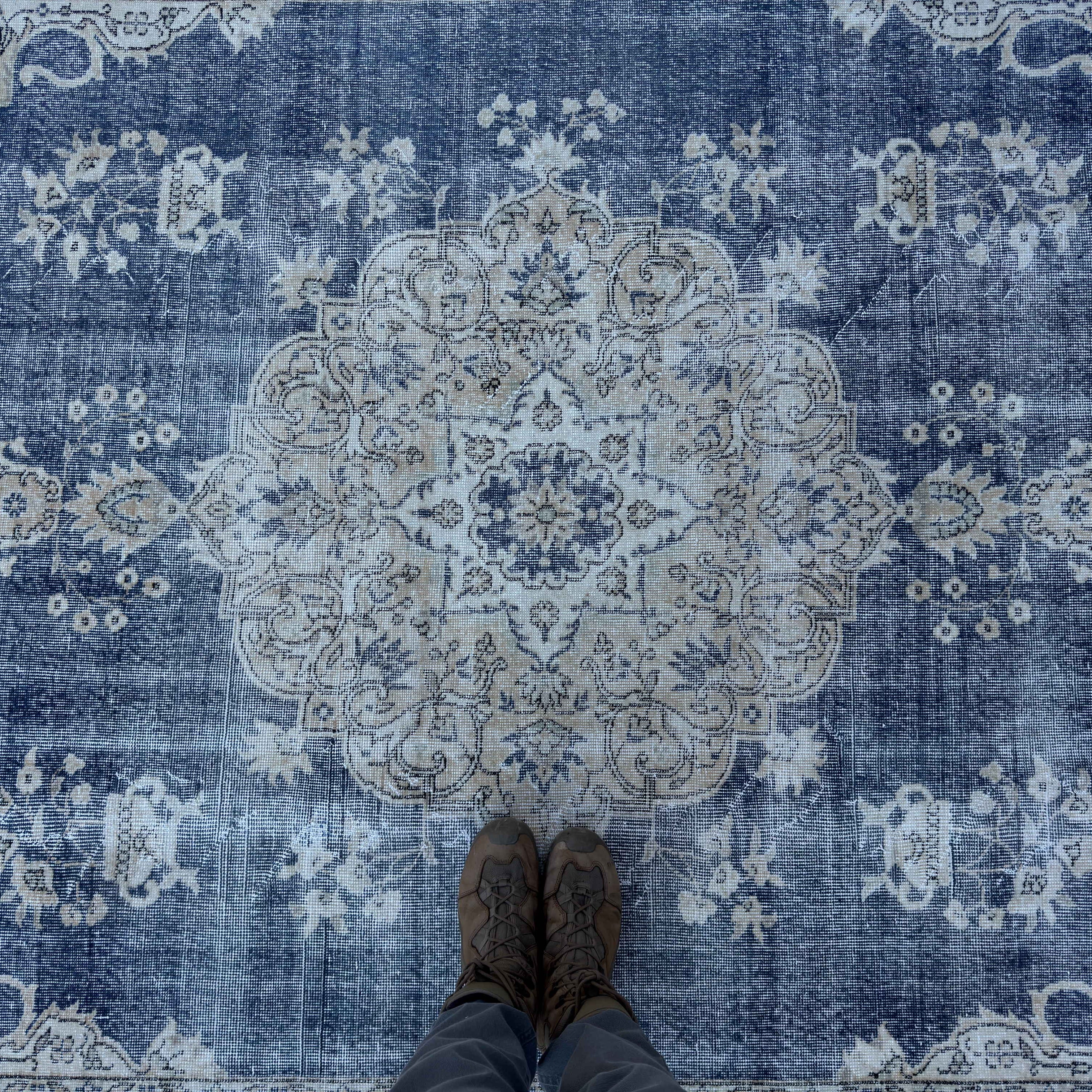 1970s blue Turkish large vintage rug with medallion and neutral design, hand-knotted weave and low pile.