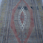 Close-up of the pale brown Turkish large wool rug showing traditional details, hand-knotted weave, wool and low pile.