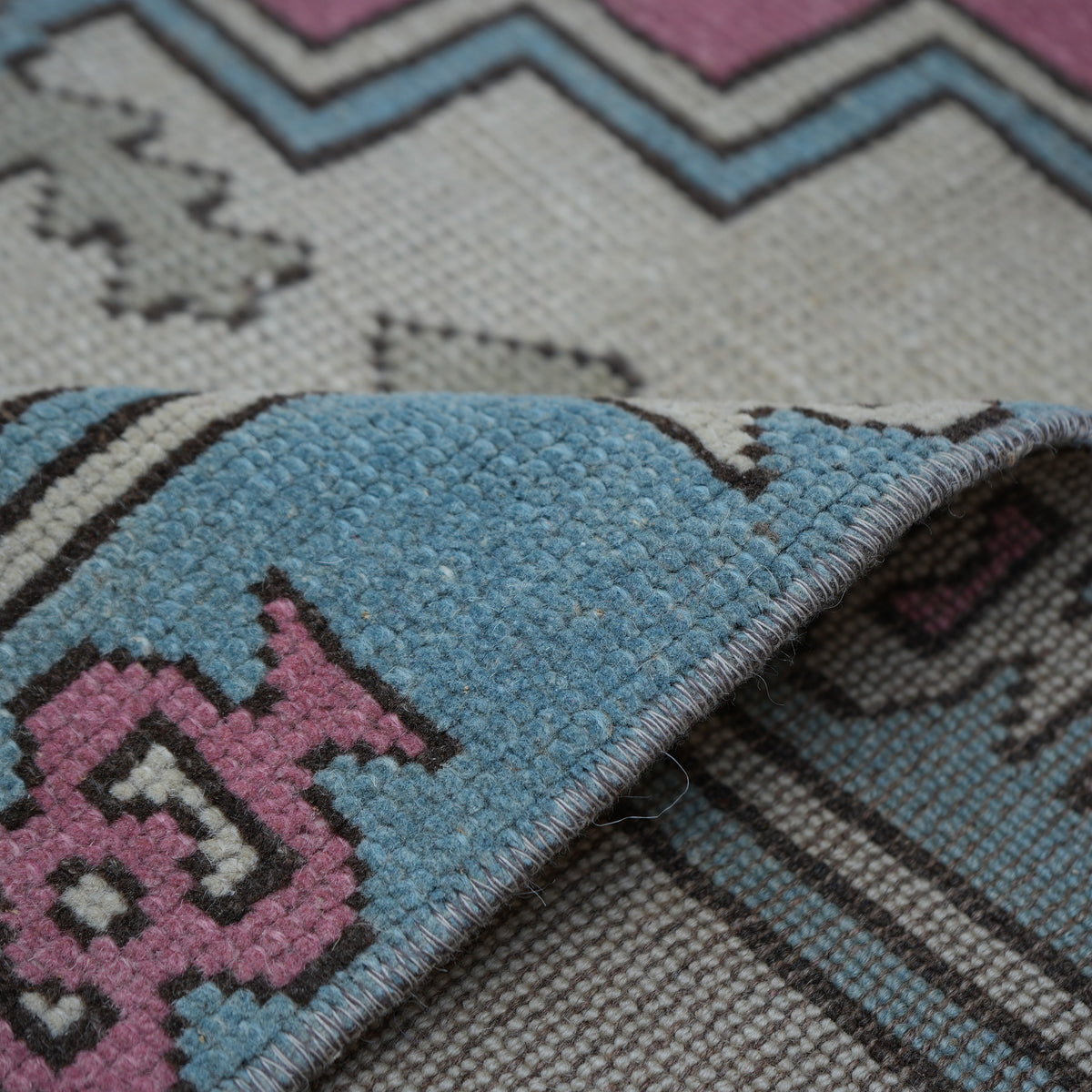 Additional view of the pale pink Turkish large wool rug, hand-knotted in wool.