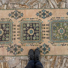 1970s beige Turkish long vintage runner rug with geometric design, hand-knotted weave and low pile.