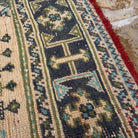 Additional view of the beige Turkish long vintage runner rug, hand-knotted in wool.