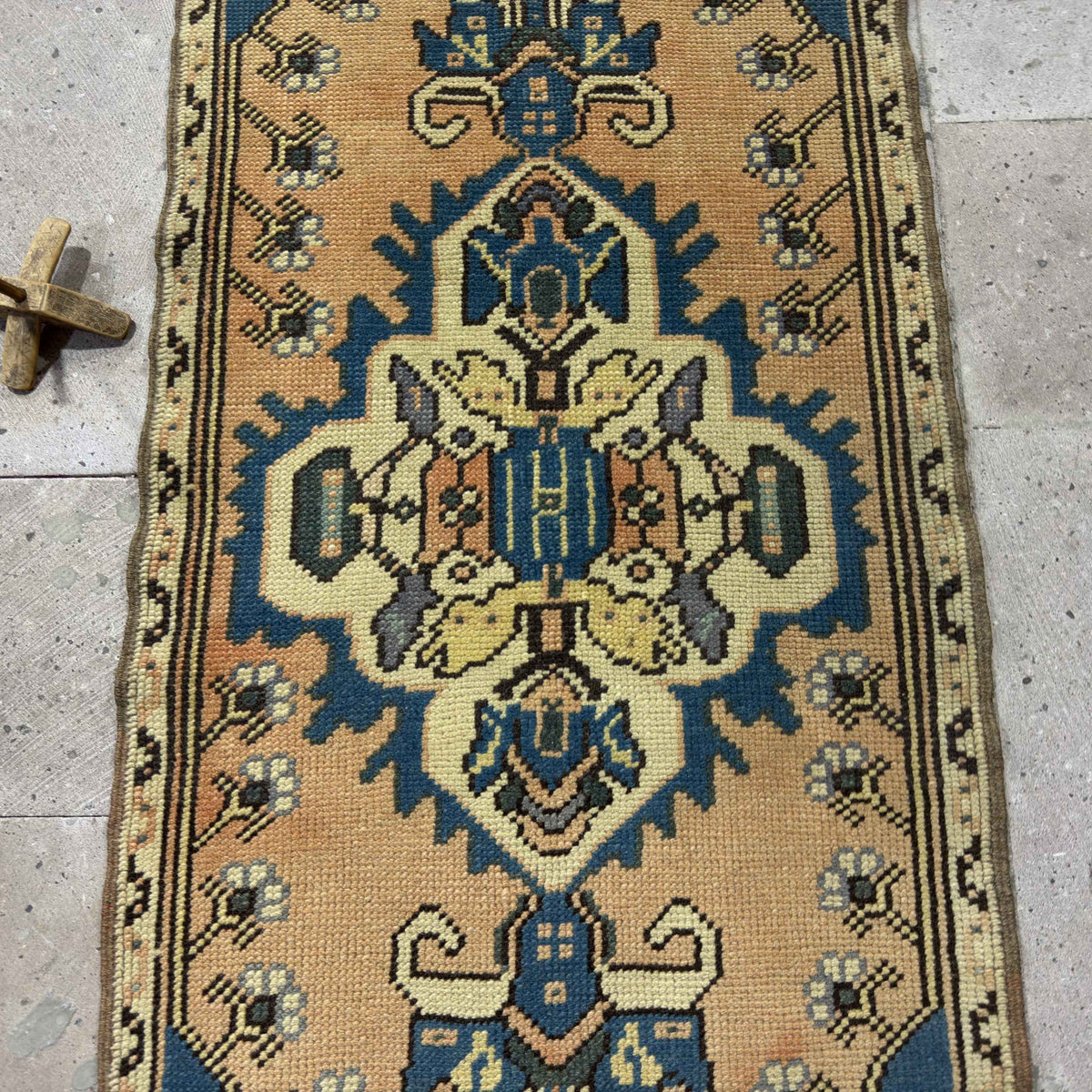 1970s blue Turkish mini runner rug with traditional design, hand-knotted weave and low pile.