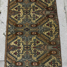 1970s brown Turkish mini vintage rug with neutral design, hand-knotted weave and low pile.