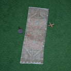 Brown 1' x 4' mini vintage rug with traditional design, handmade in Turkey – Blisse.