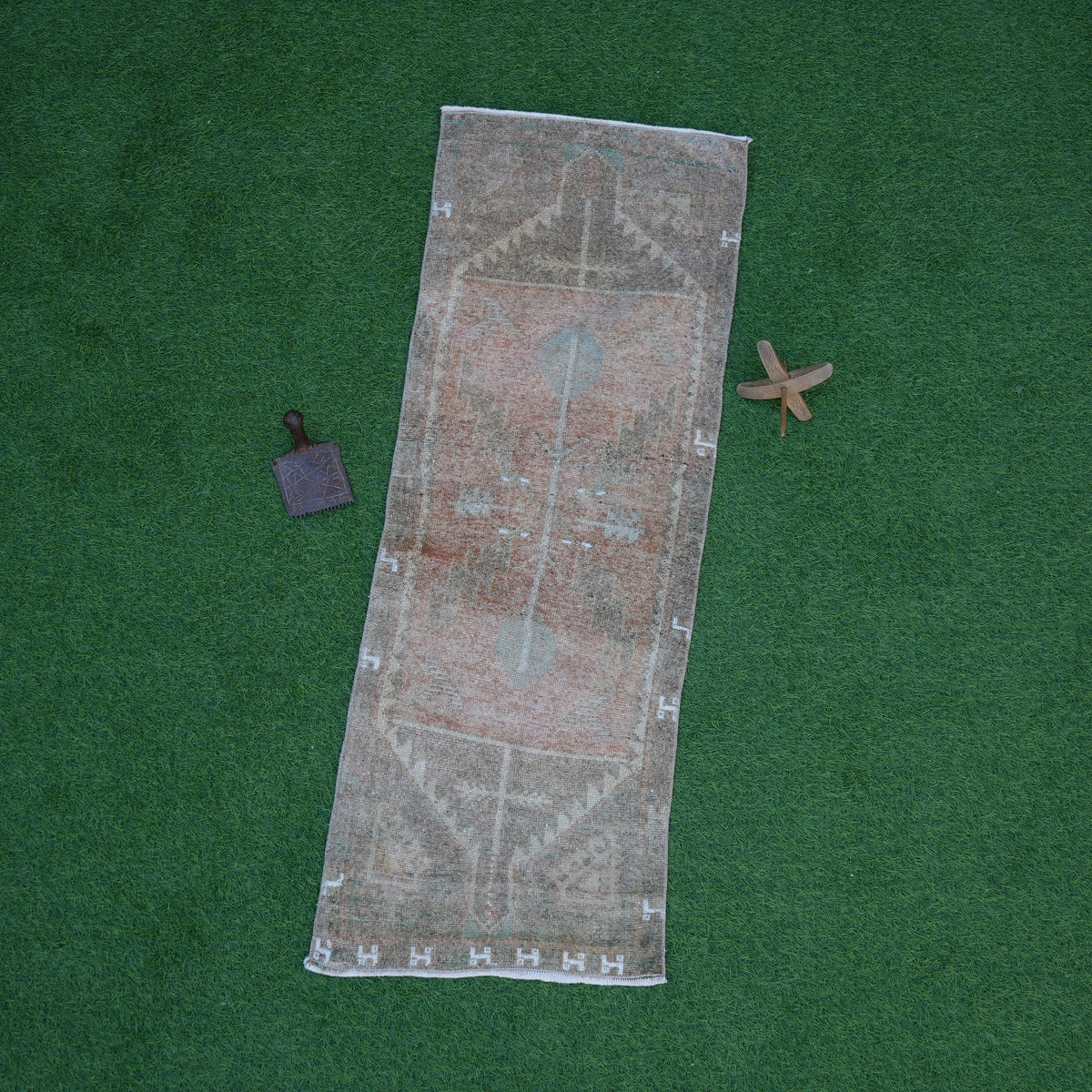 Brown 1' x 4' mini vintage rug with traditional design, handmade in Turkey – Blisse.