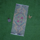 Beige 2' x 3' mini vintage rug with traditional design, handmade in Turkey – Ina.