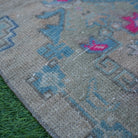 Beige 2' x 3' Turkish mini vintage rug in wool and cotton, shown on the floor.