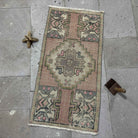 Pink 2' x 3' mini vintage rug with traditional design, handmade in Turkey – Patty.