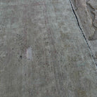 Close-up of the beige Turkish muted vintage rug showing neutral details, hand-knotted weave, wool and cotton and low pile.