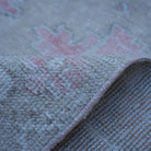 Additional view of the pale red neutral turkish rug, hand-knotted in wool and cotton.