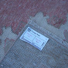 Pale Red 4' x 7' neutral turkish rug from the 1970s with neutral design.