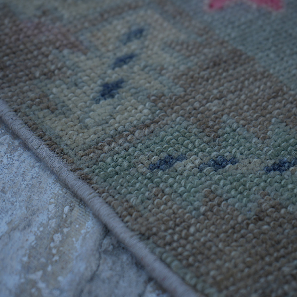 Beige 4' x 8' Turkish neutral vintage rug in wool, shown on the floor.
