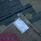 Beige 4' x 8' Turkish neutral vintage rug from the 1970s with neutral design.