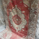 1970s red Turkish oriental wool rug with medallion design, hand-knotted weave and low pile.