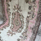 Brown 6' x 10' Turkish oriental wool rug in wool and cotton, shown on the floor.