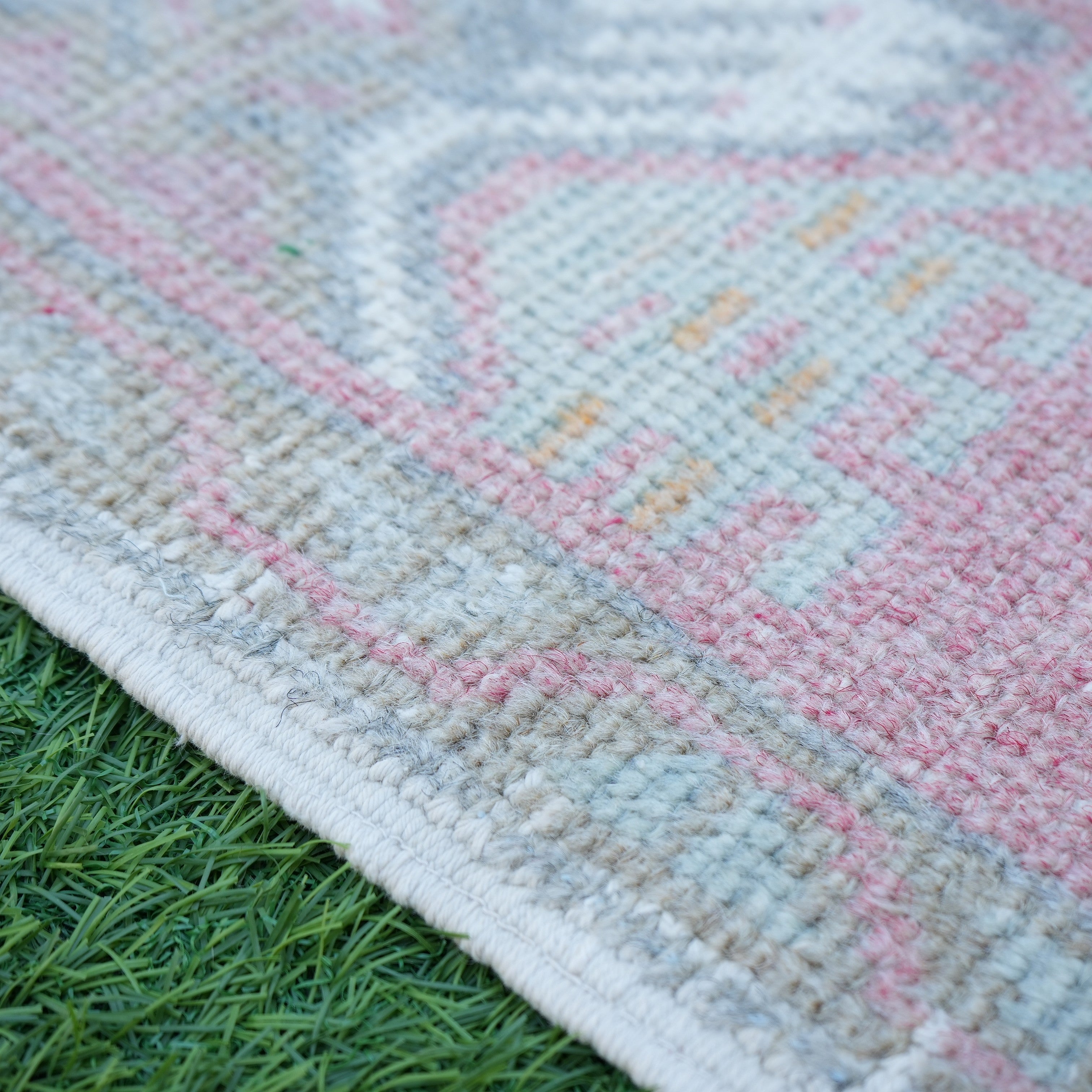Red 1' x 3' Turkish oushak mini rug in wool and cotton, shown on the floor.