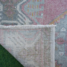 1970s red Turkish oushak mini rug with traditional design, hand-knotted weave and low pile.