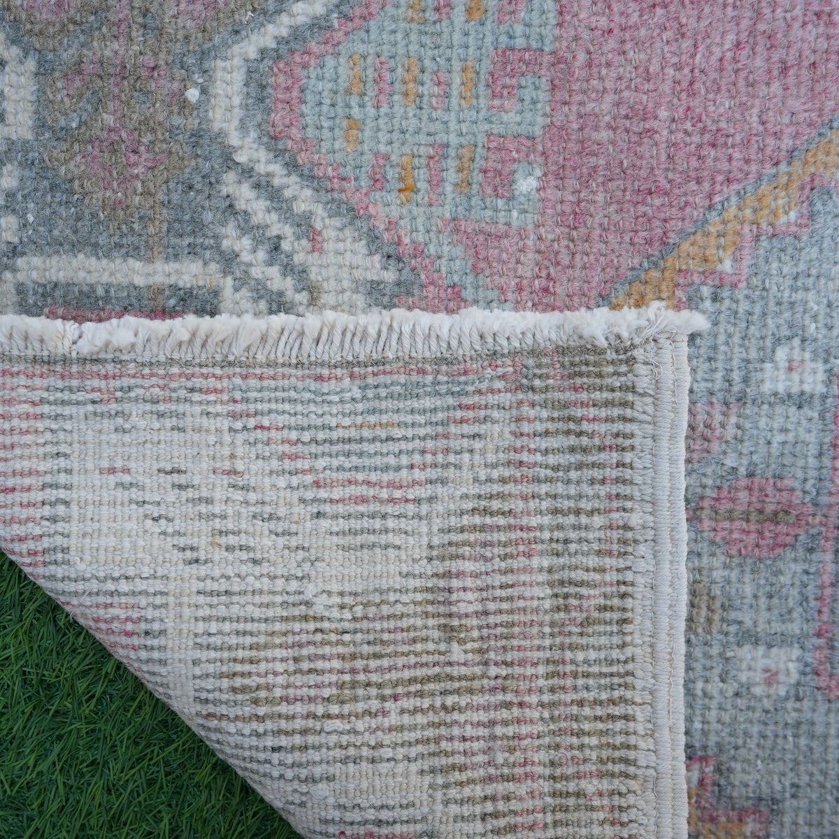 1970s red Turkish oushak mini rug with traditional design, hand-knotted weave and low pile.