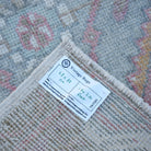 Red 1' x 3' Turkish oushak mini rug from the 1970s with traditional design.