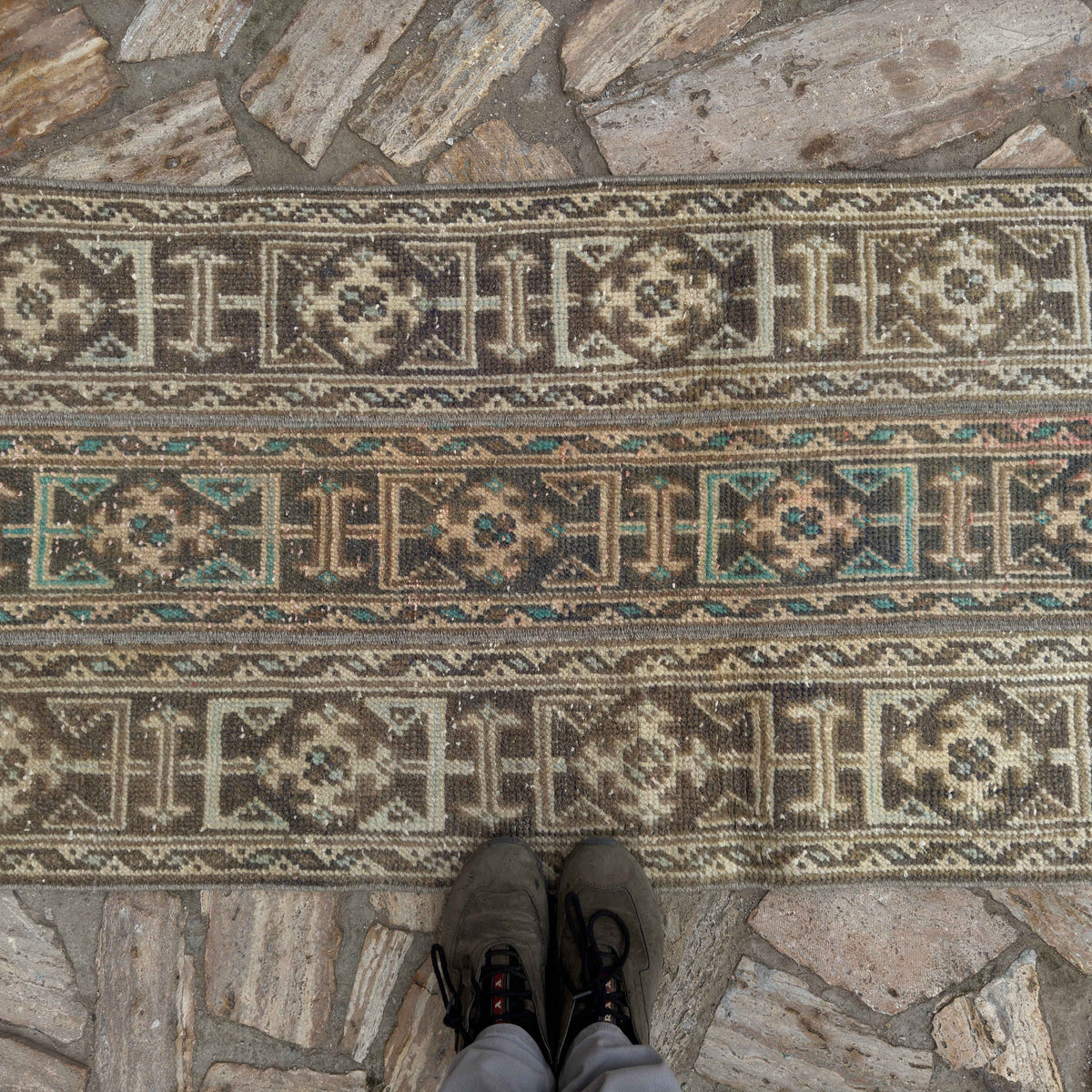 1970s beige Turkish patchwork runner rug with patchwork design, hand-knotted weave and low pile.