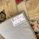 Close-up of the beige Turkish patchwork runner rug showing patchwork details, hand-knotted weave, wool and cotton and low pile.