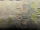 Close-up of the beige Turkish pillow cover showing neutral details, low pile.