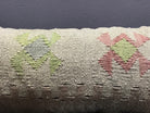 Close-up of the colorful Turkish pillow cover showing traditional details, low pile.